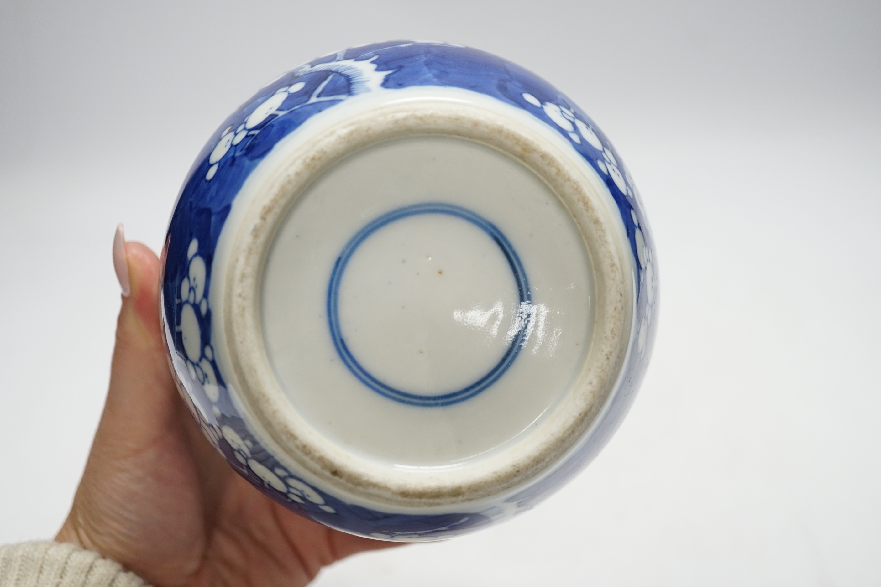 A Chinese blue and white prunus jar and cover, 14cm